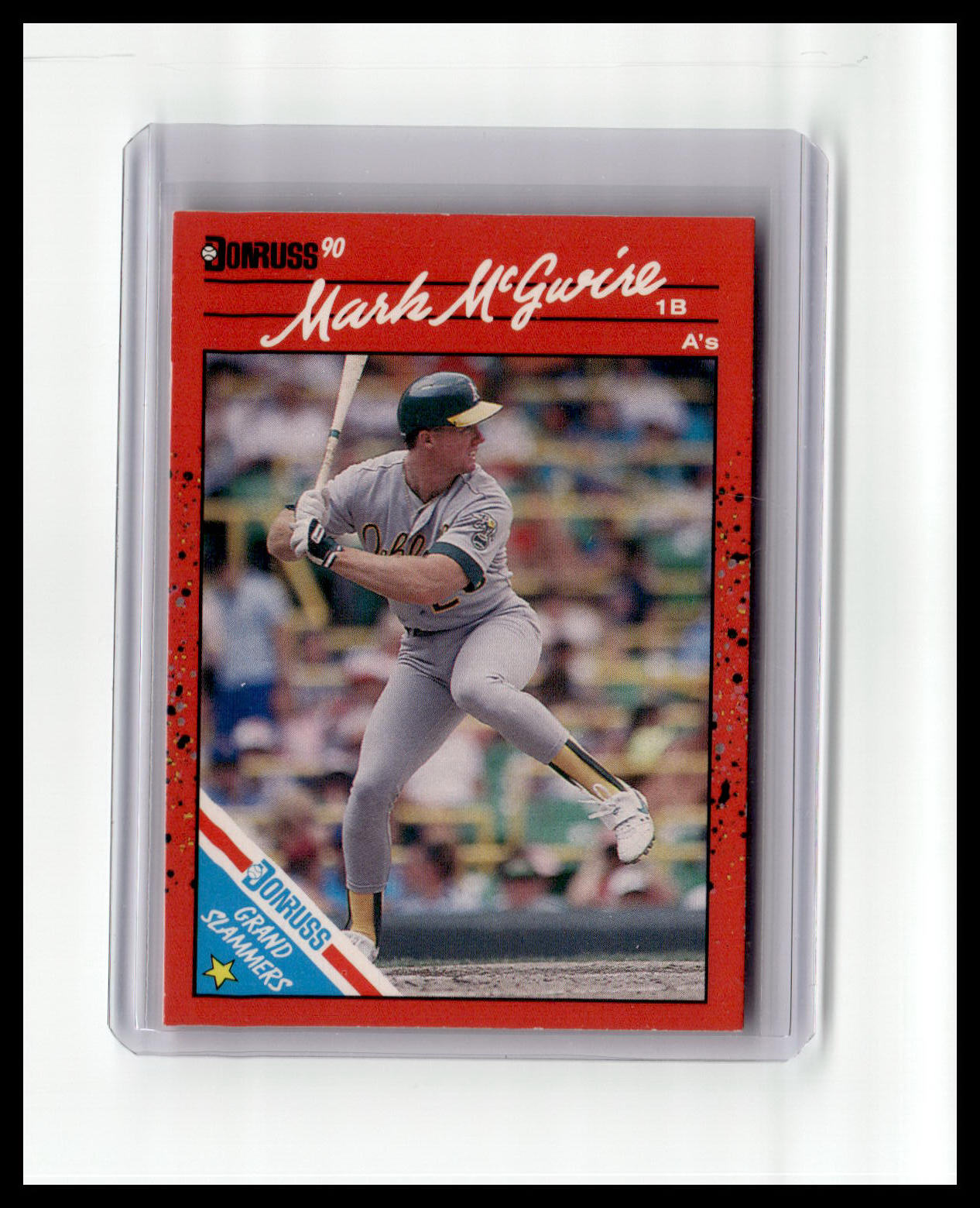 Baseball trading card of Mark McGwire with red border and image of player in action.