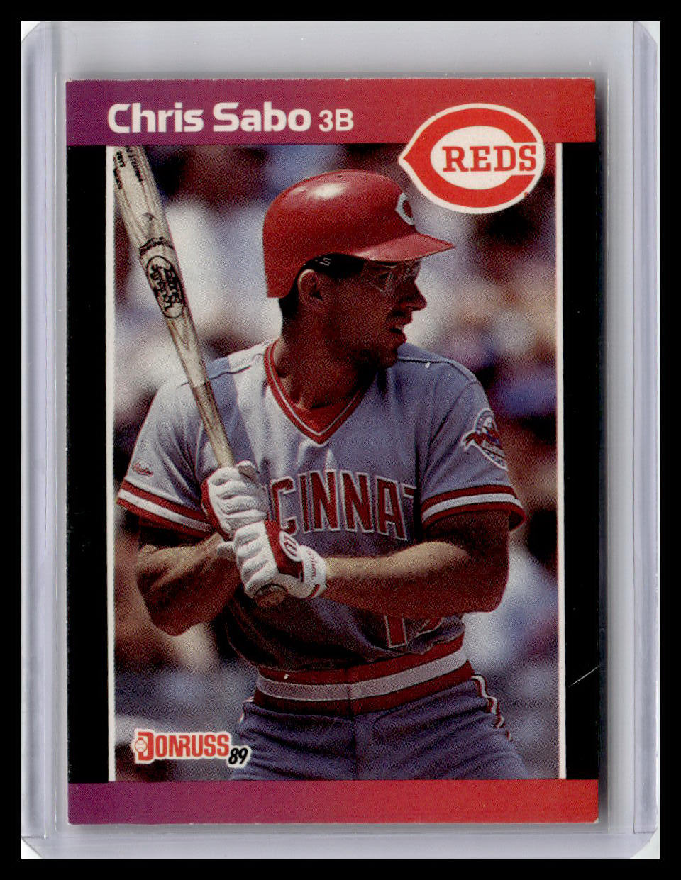 Baseball trading card of Chris Sabo with Cincinnati Reds logo