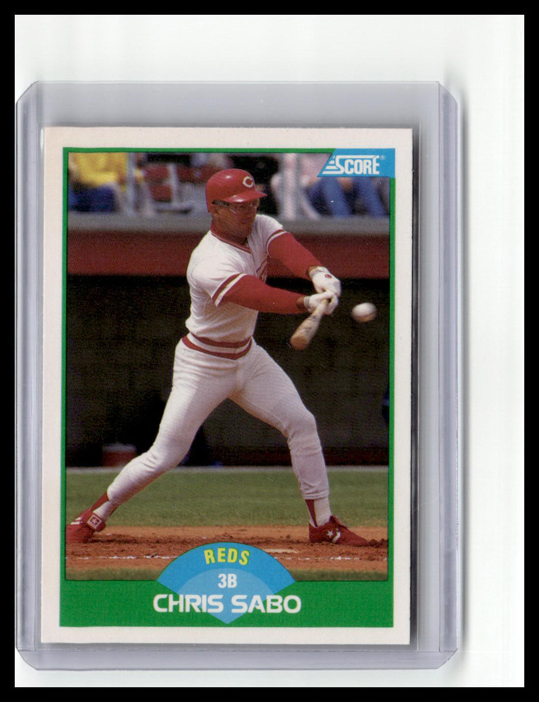 Baseball trading card of Chris Sabo in a red and white uniform, with 'Score' logo.