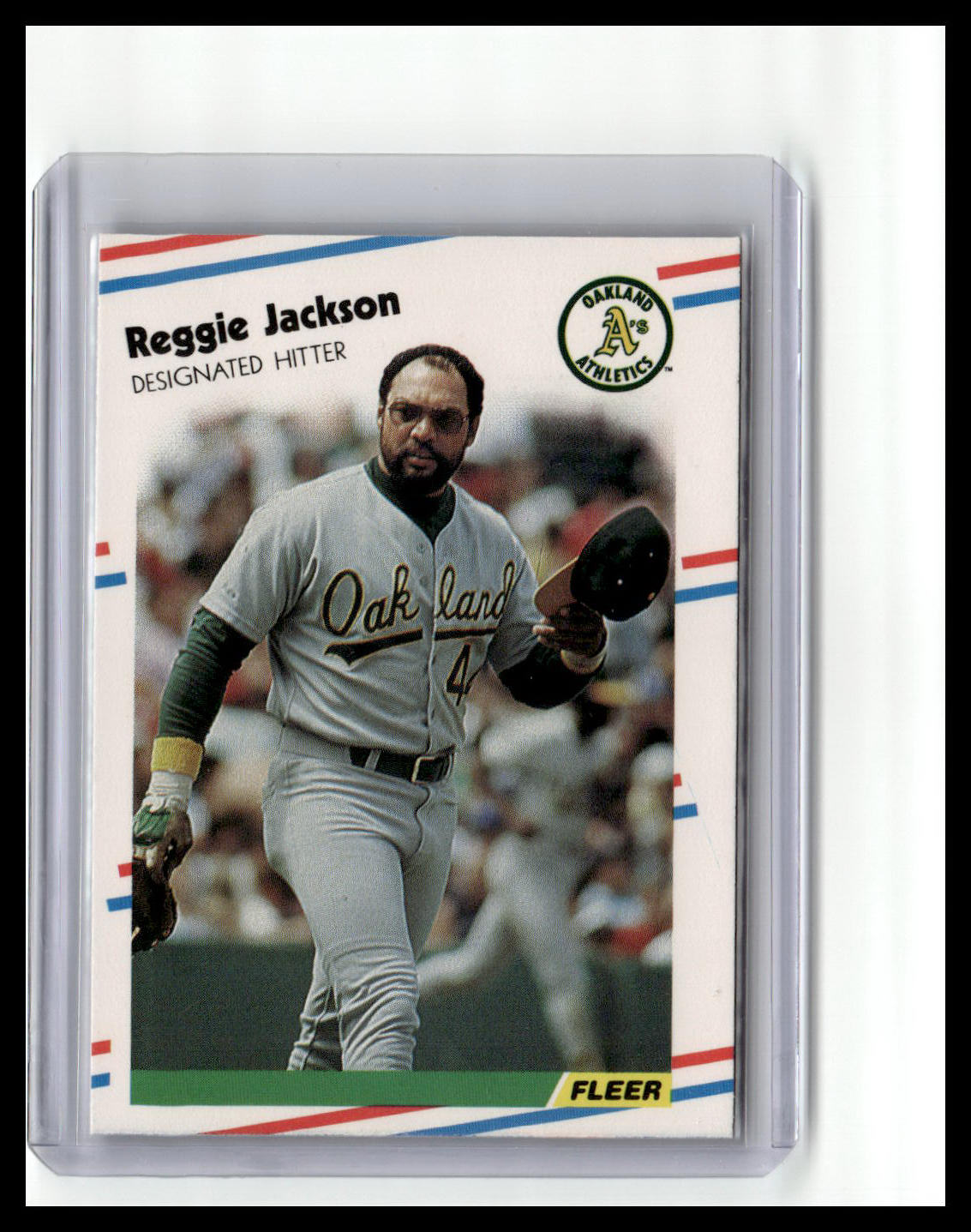 Baseball trading card of Reggie Jackson with Oakland Athletics logo