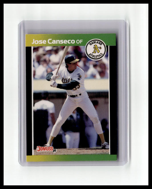 Baseball trading card of Jose Canseco with a green border and Athletics logo.