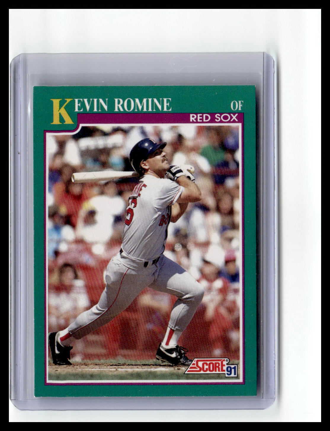 Baseball trading card of Kevin Romine from the Red Sox in a display case.