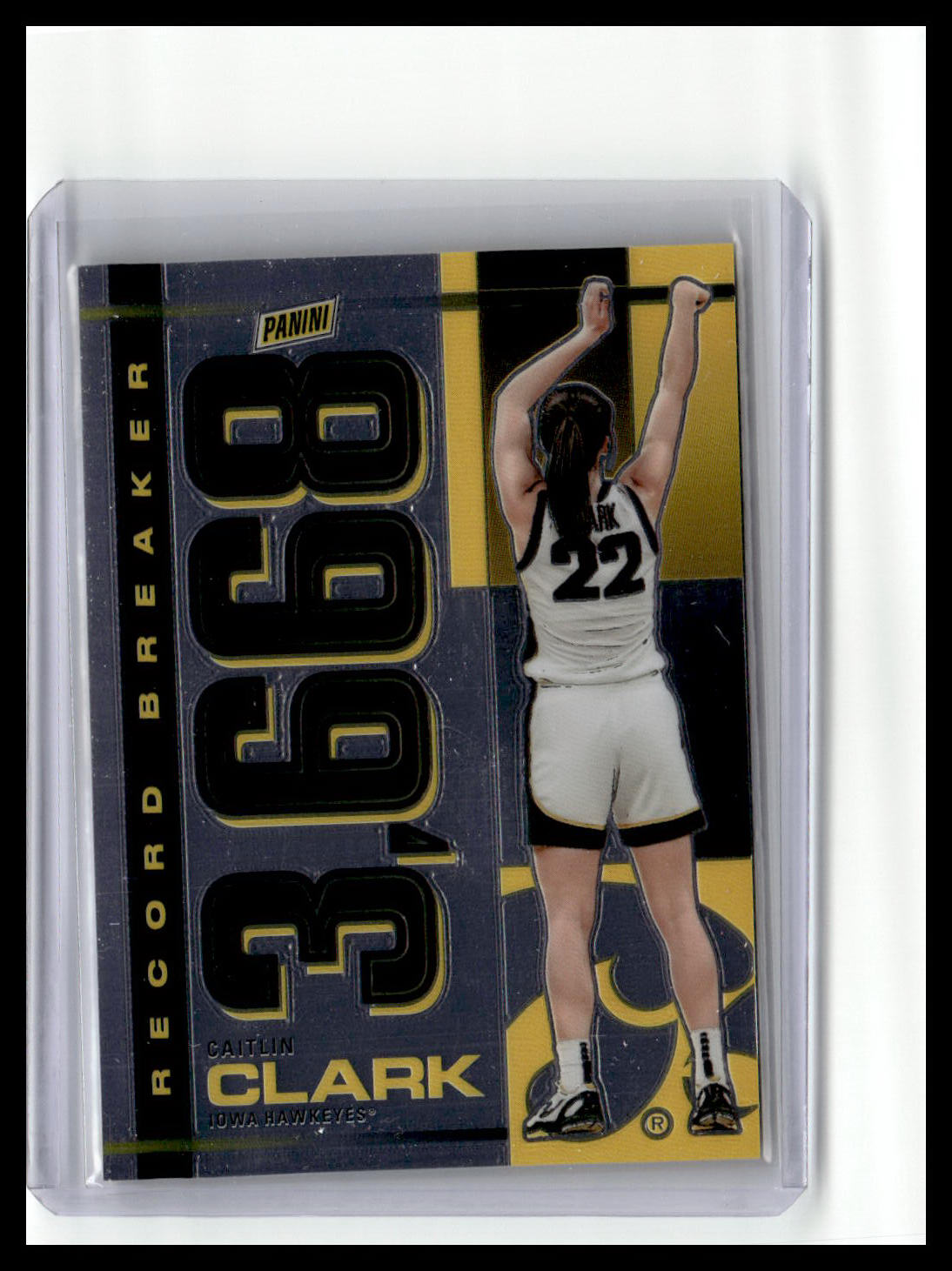 Basketball trading card featuring a player with the number 22, set against a blue and yellow background.