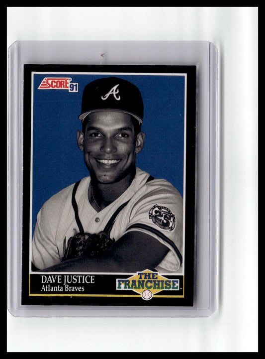 Baseball trading card of Dave Justice with Atlanta Braves uniform on a blue background