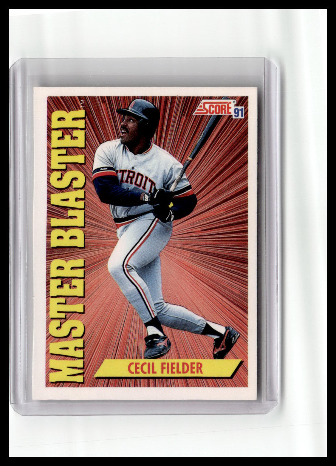 Baseball trading card of Cecil Fielder in a protective case