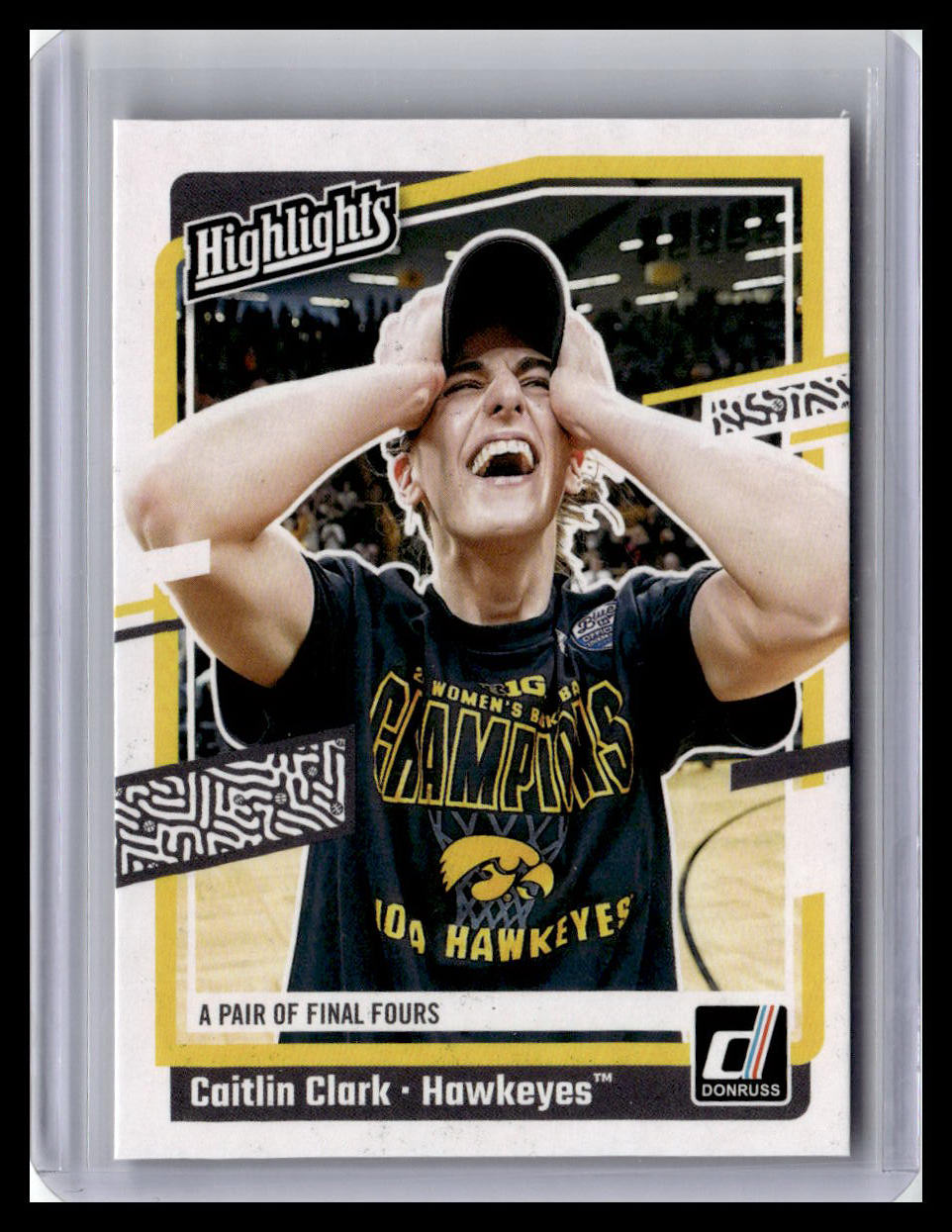 Trading card of a person celebrating with 'Hawkeyes' shirt, framed in protective case.