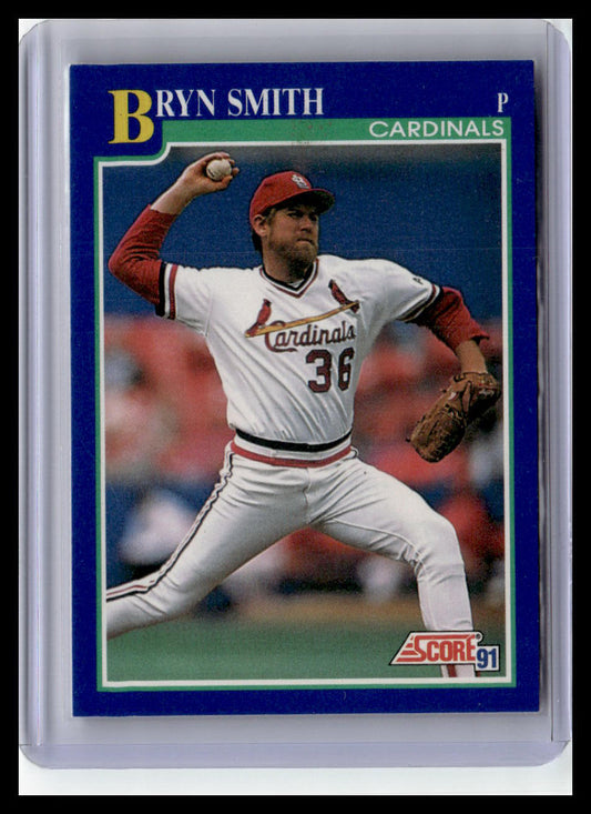 Baseball trading card of a player in a white uniform with red accents, holding a baseball and glove.