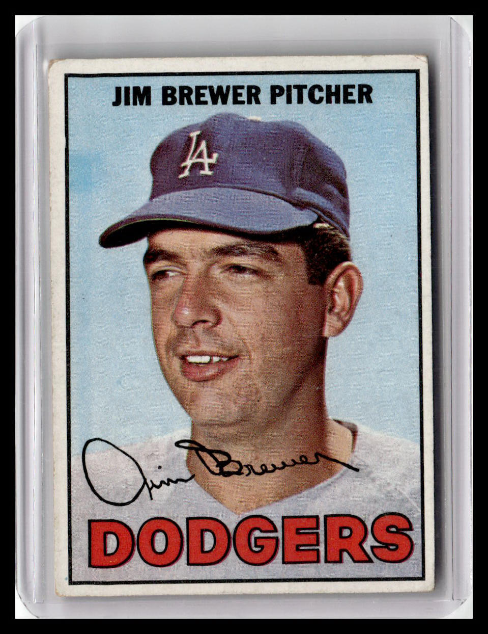 Baseball trading card of Jim Brewer, pitcher for the Dodgers, with a clear border.