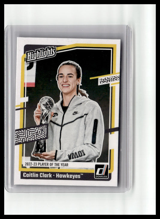 Trading card of Caitlin Clark holding a trophy, framed by 'Highlights' branding.