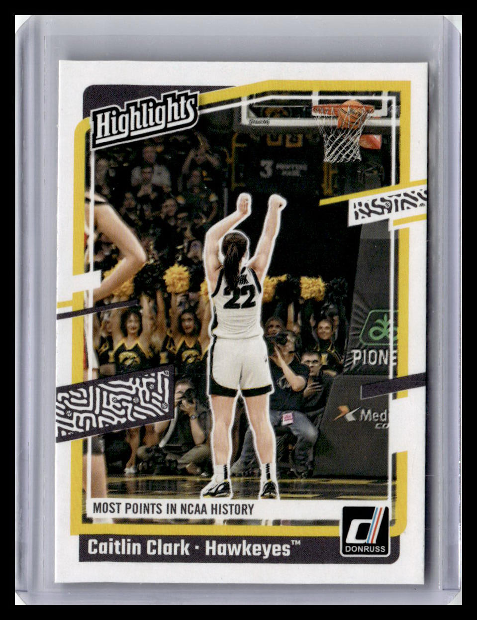 Basketball trading card featuring a player in action with celebratory crowd in the background