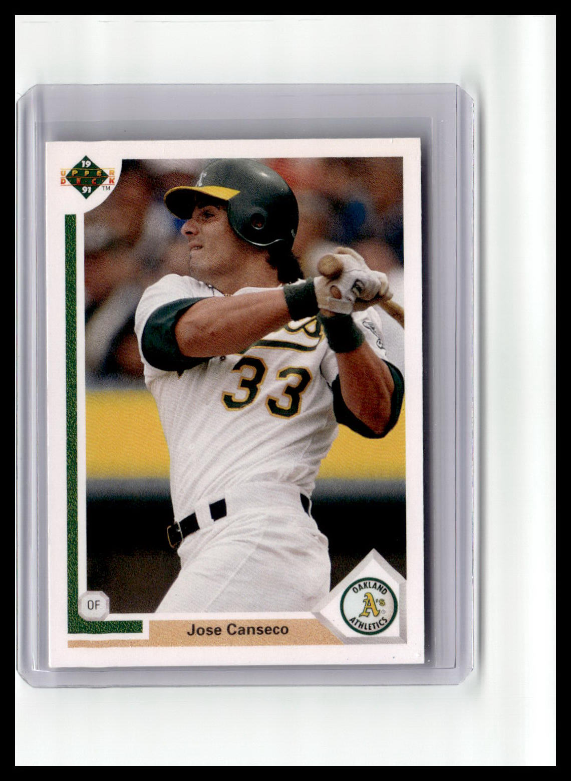 Baseball trading card of Jose Canseco with a clear protective sleeve.
