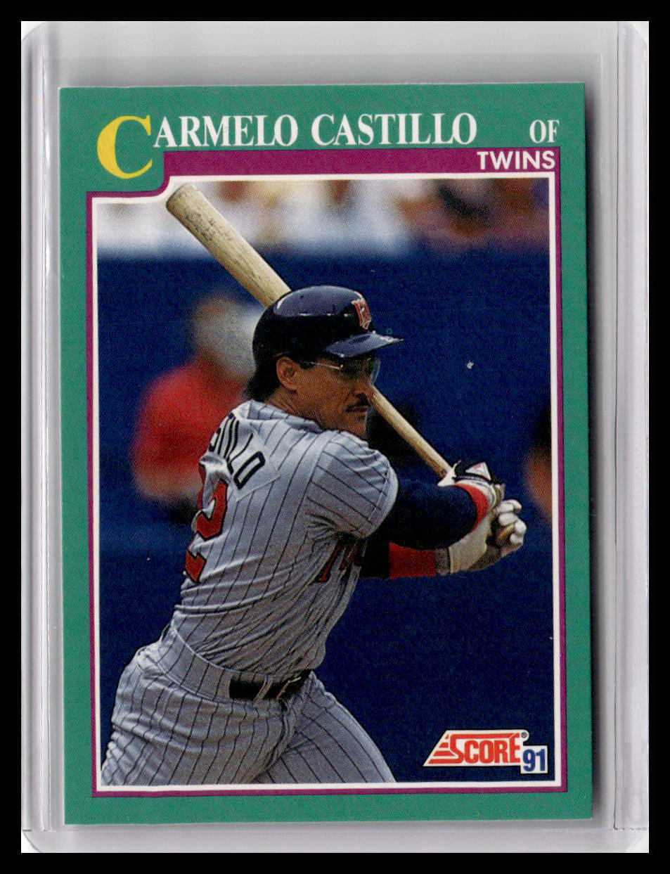 Baseball trading card of Carmelo Castillo with a blue border and Score logo.