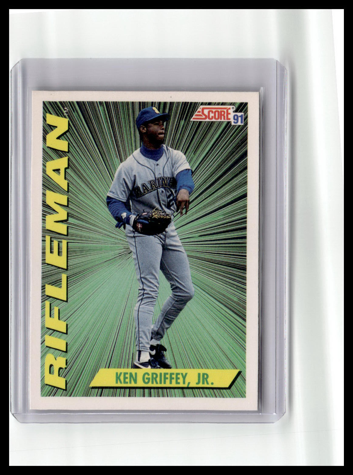 Baseball trading card of Ken Griffey Jr. with 'Rifleman' text and Score logo.
