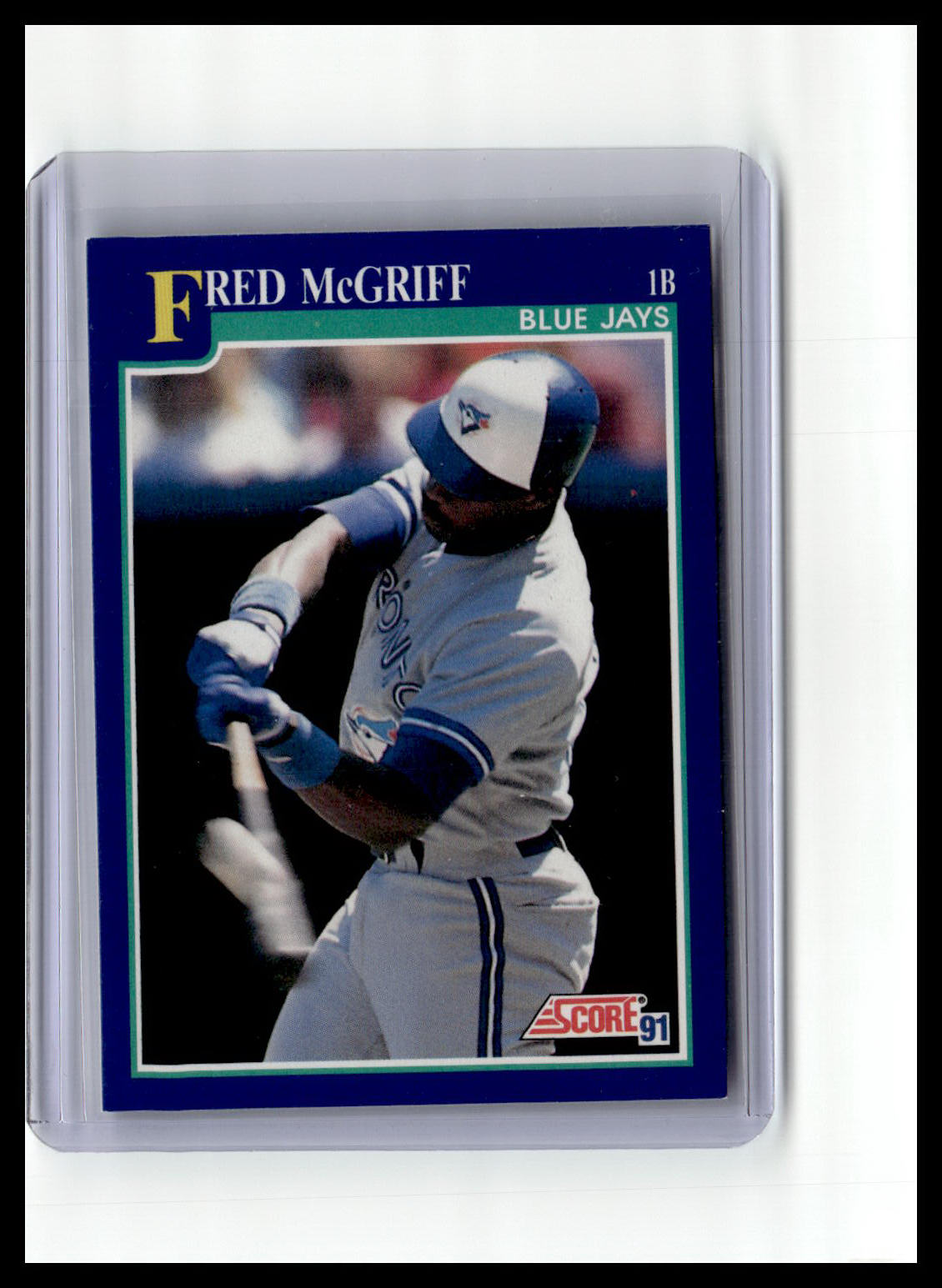 Baseball trading card of Fred McGriff with Blue Jays uniform on a white background