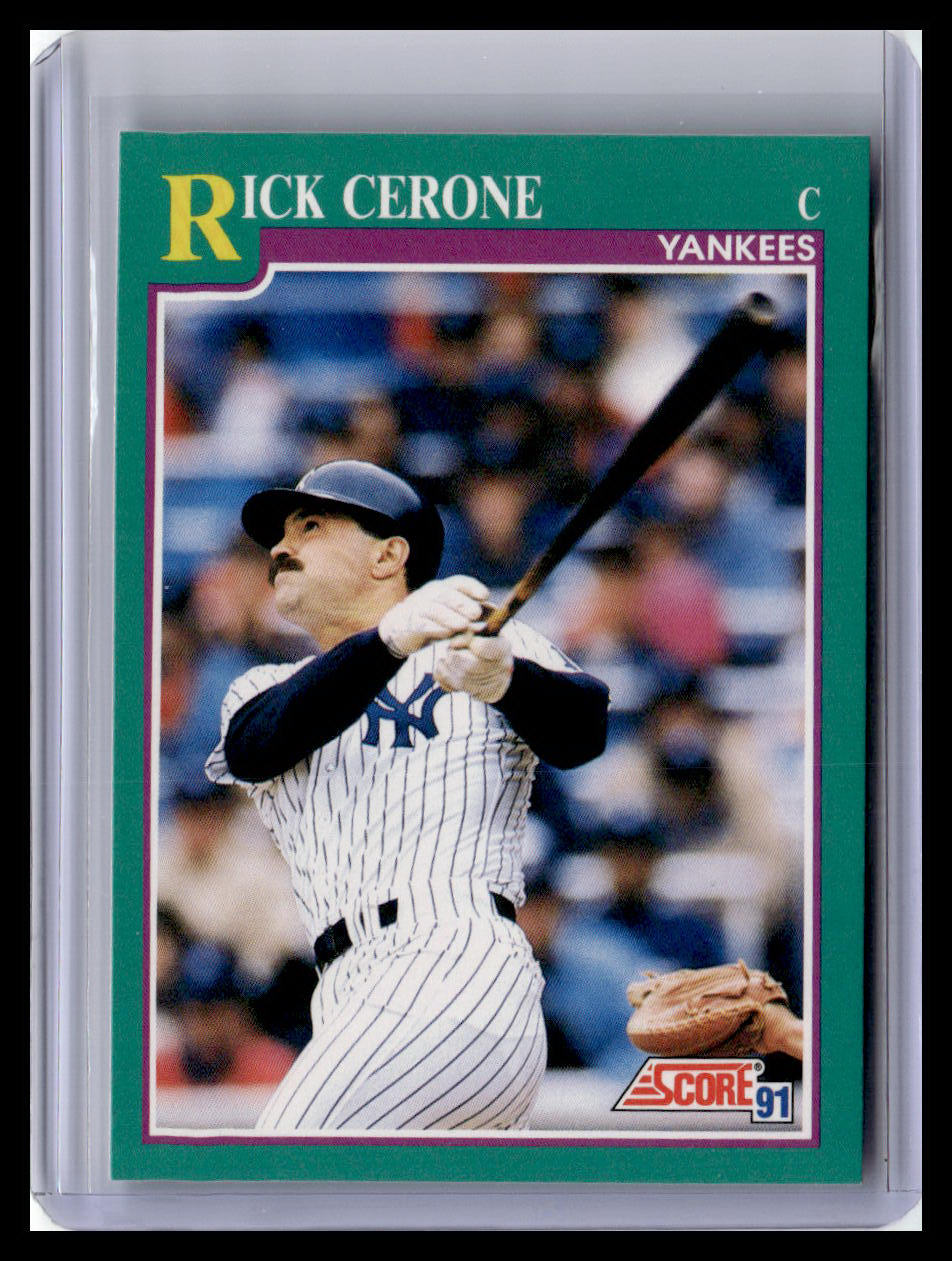 Baseball trading card of Rick Cerone holding a bat with a green border