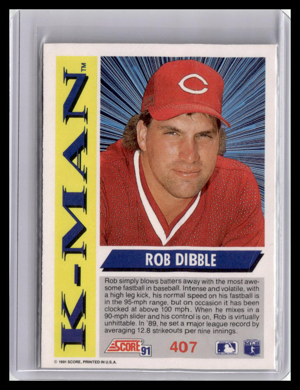 Baseball trading card of Rob Dibble with a red cap and jersey, featuring the K-Mart logo.