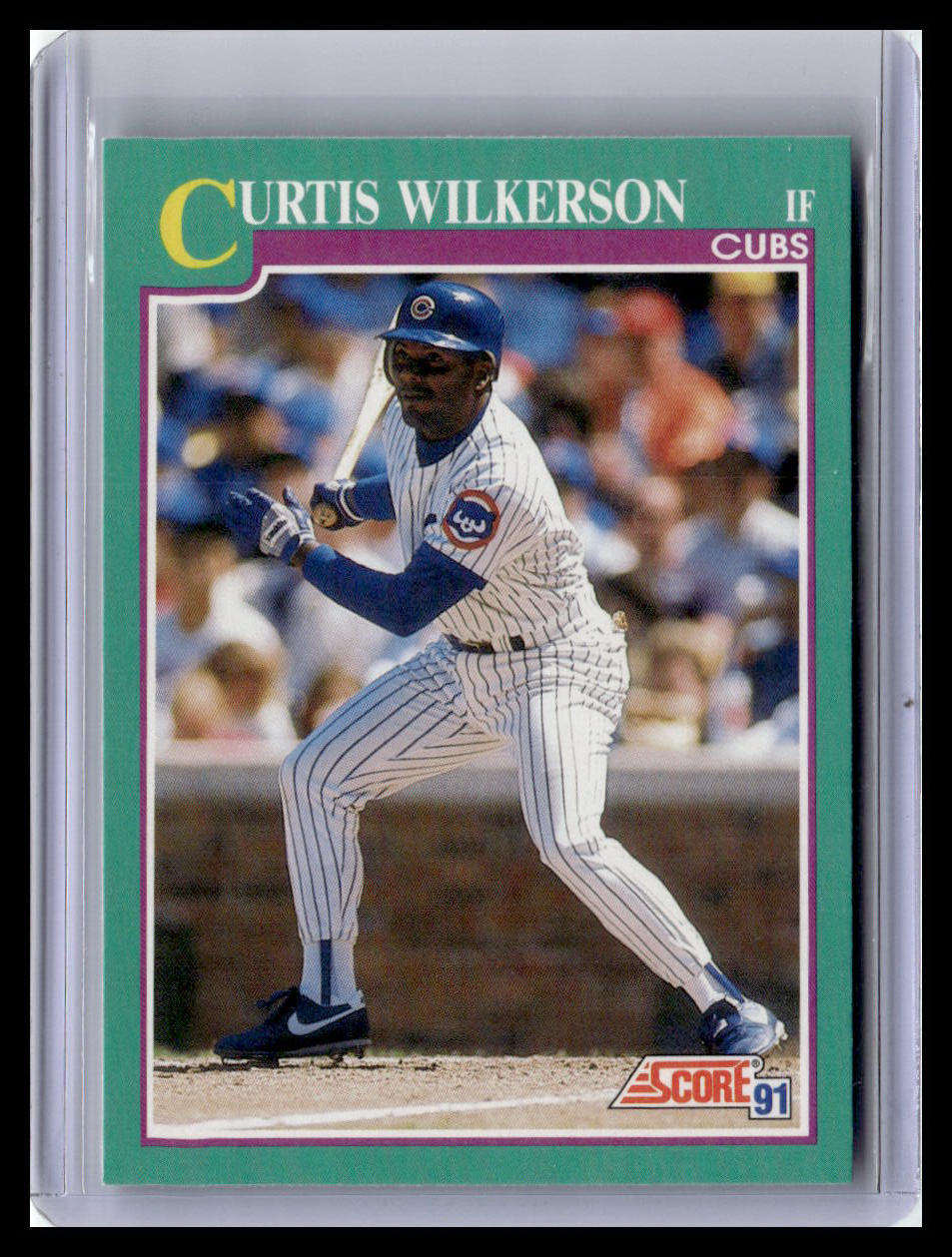 Baseball trading card of Curtis Wilkerson with a green border and 'Score' logo.