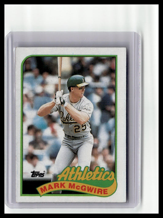 Baseball trading card of Mark McGwire with 'Athletics' logo and Topps branding.