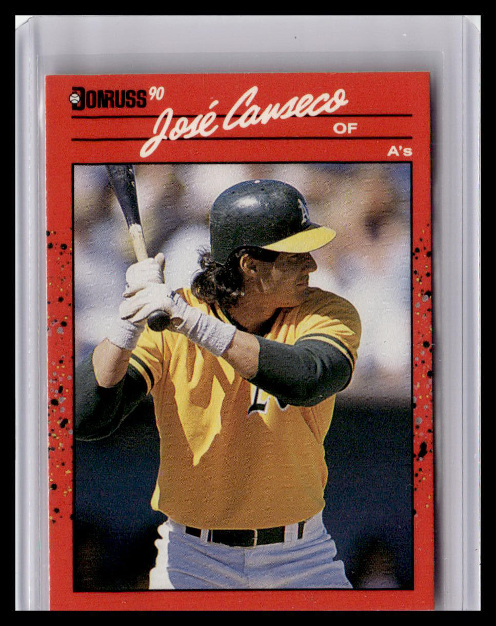 Baseball trading card of a player in a yellow jersey and black helmet, holding a bat.