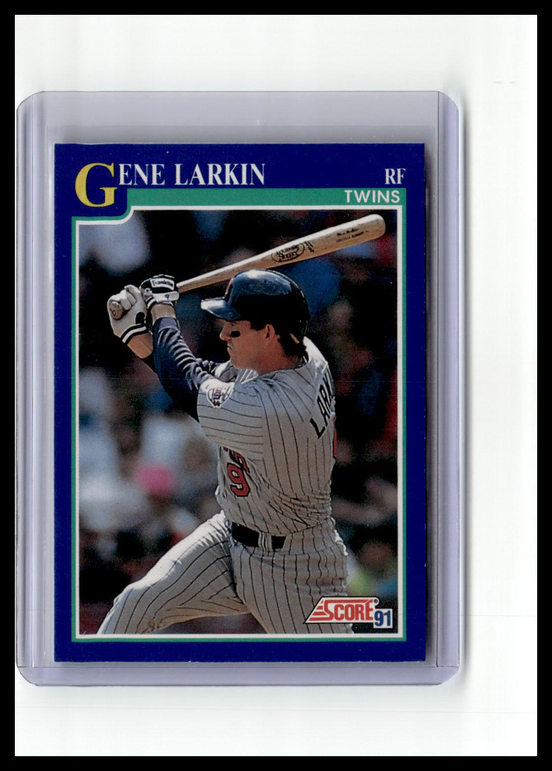 Baseball trading card of Gene Larkin in a Twins uniform with a bat