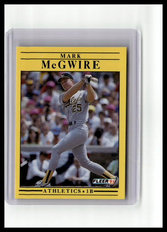 Baseball trading card of Mark McGwire in a yellow border with 'Fleer' branding.