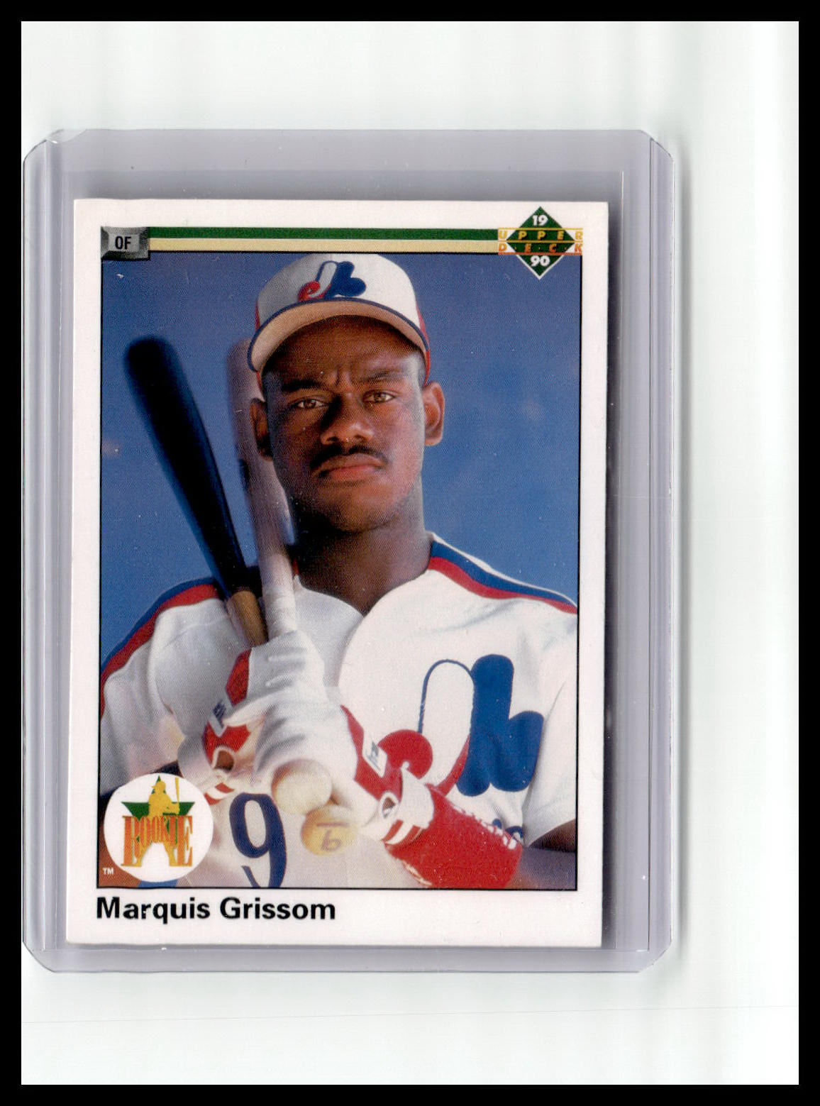 Baseball trading card of Marquis Grissom with a blue sky background