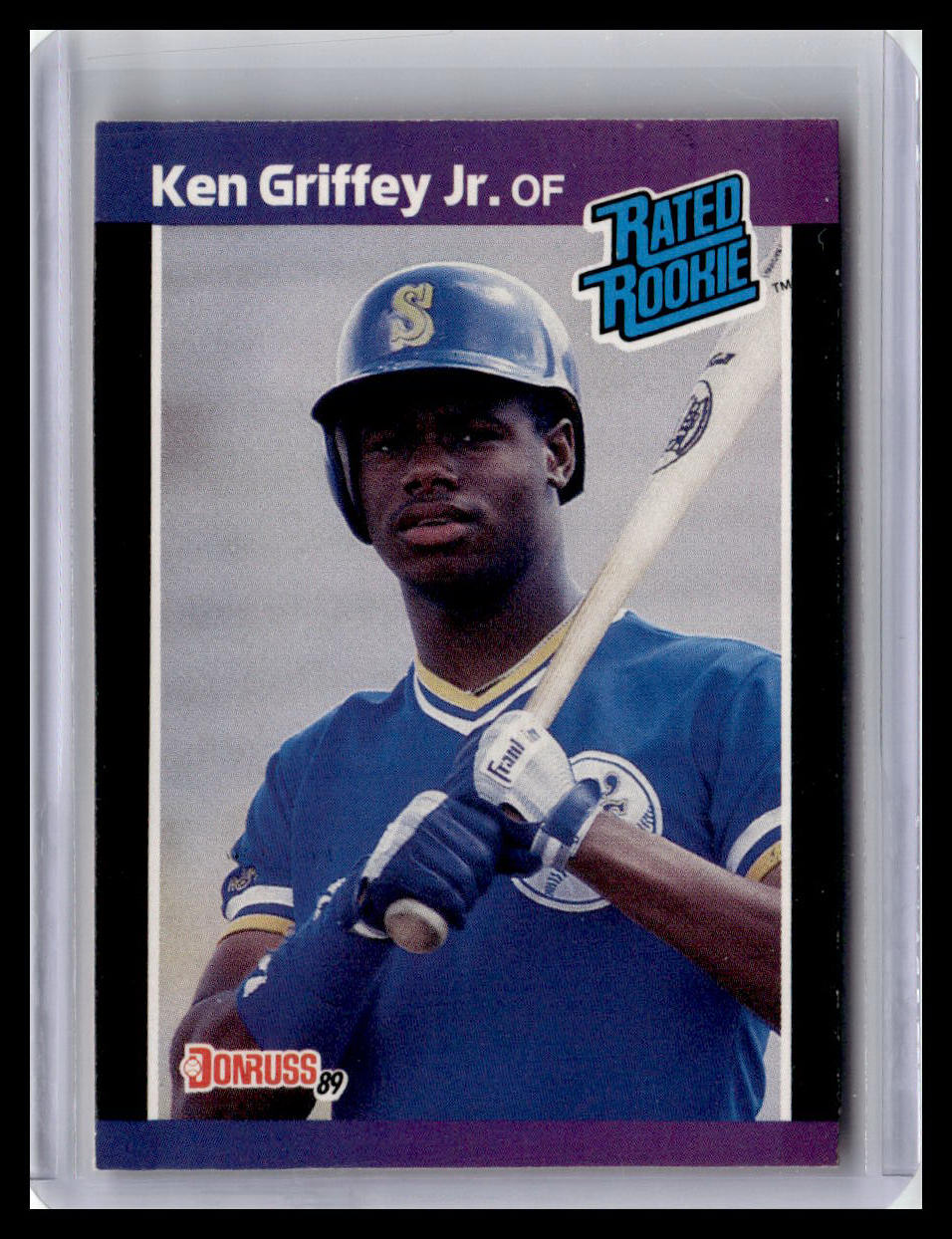 Baseball trading card of Ken Griffey Jr. with a blue helmet and bat, featuring 'Donruss' branding.