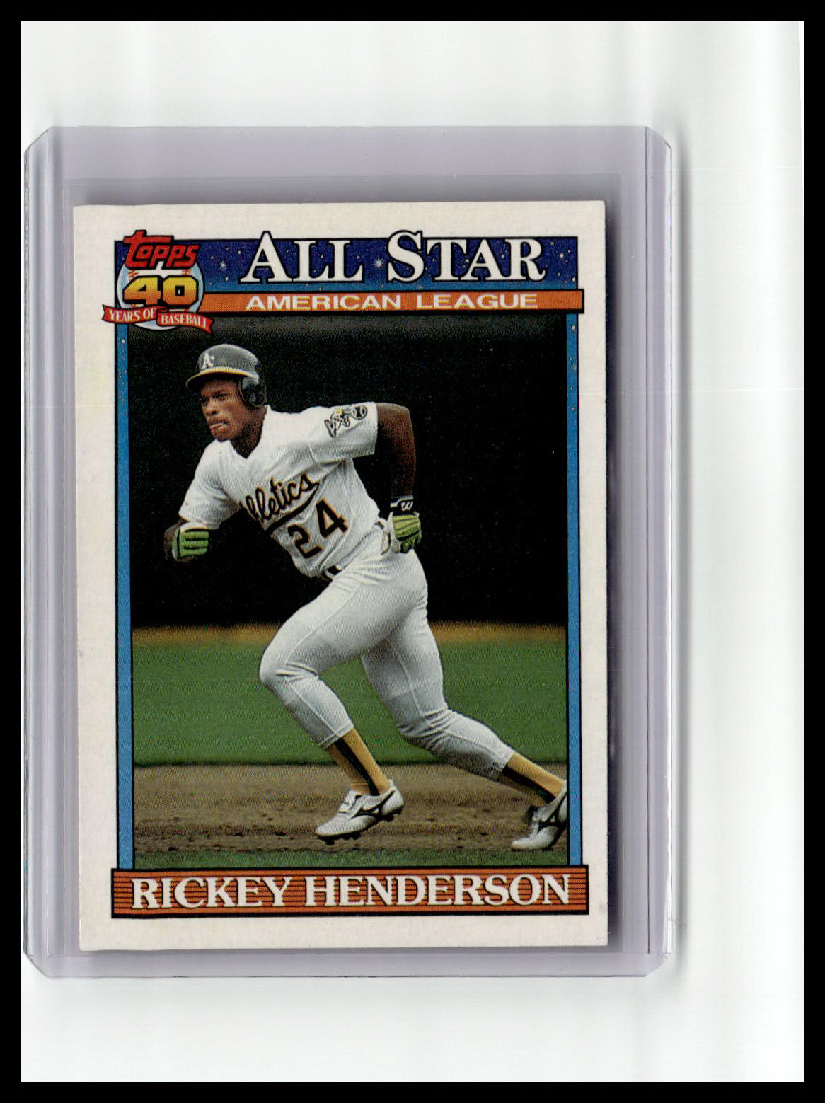 Baseball trading card of Rickey Henderson in a white uniform with number 24, encased in a clear holder.
