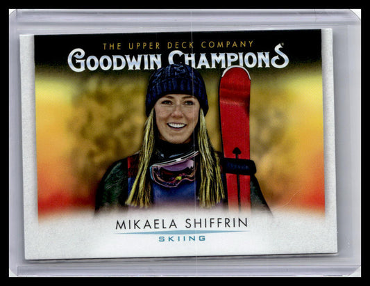 Trading card featuring Mikaela Shiffrin with a red ski and blurred background