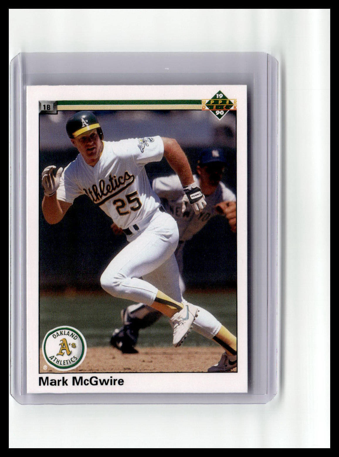 Baseball trading card of Mark McGwire in a white uniform with 'Athletics' on a white background