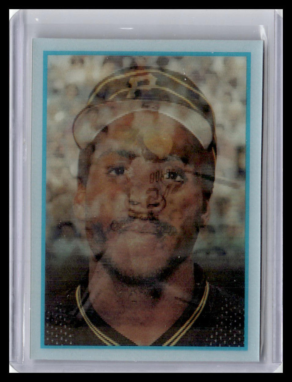 Baseball trading card of a player with a cap and jersey, encased in protective plastic.