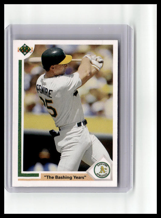 Baseball trading card of a player in a white uniform with a green border