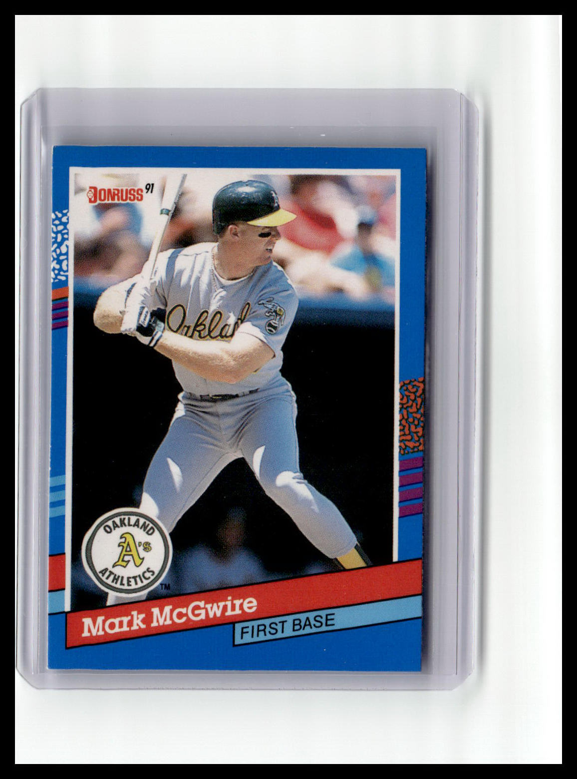 Baseball trading card of Mark McGwire with Oakland Athletics logo