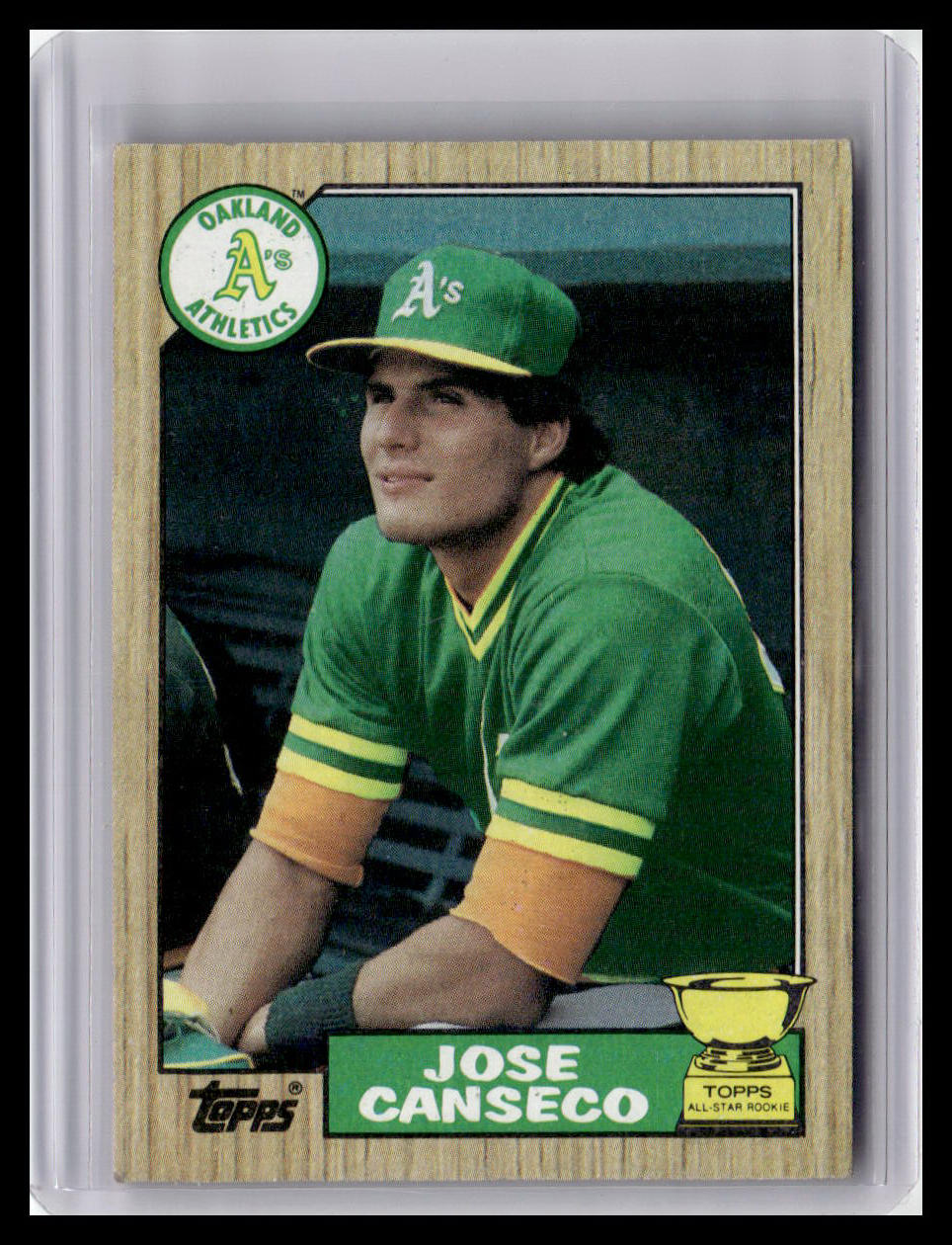 Baseball trading card of Jose Canseco in a green Oakland Athletics uniform